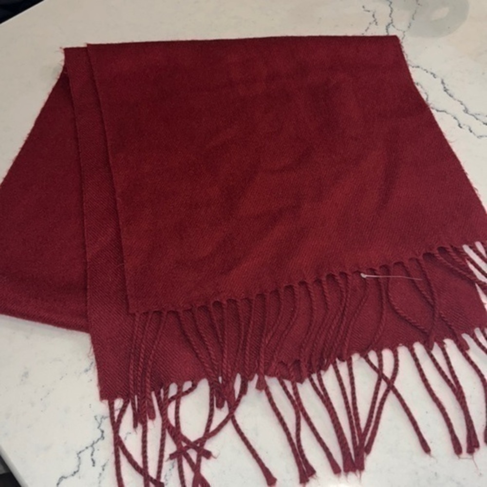 Red scarf . Excellent condition . Soft and warm . Red color